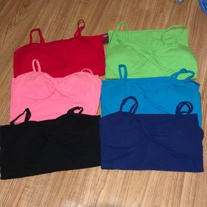Six colorful tank tops